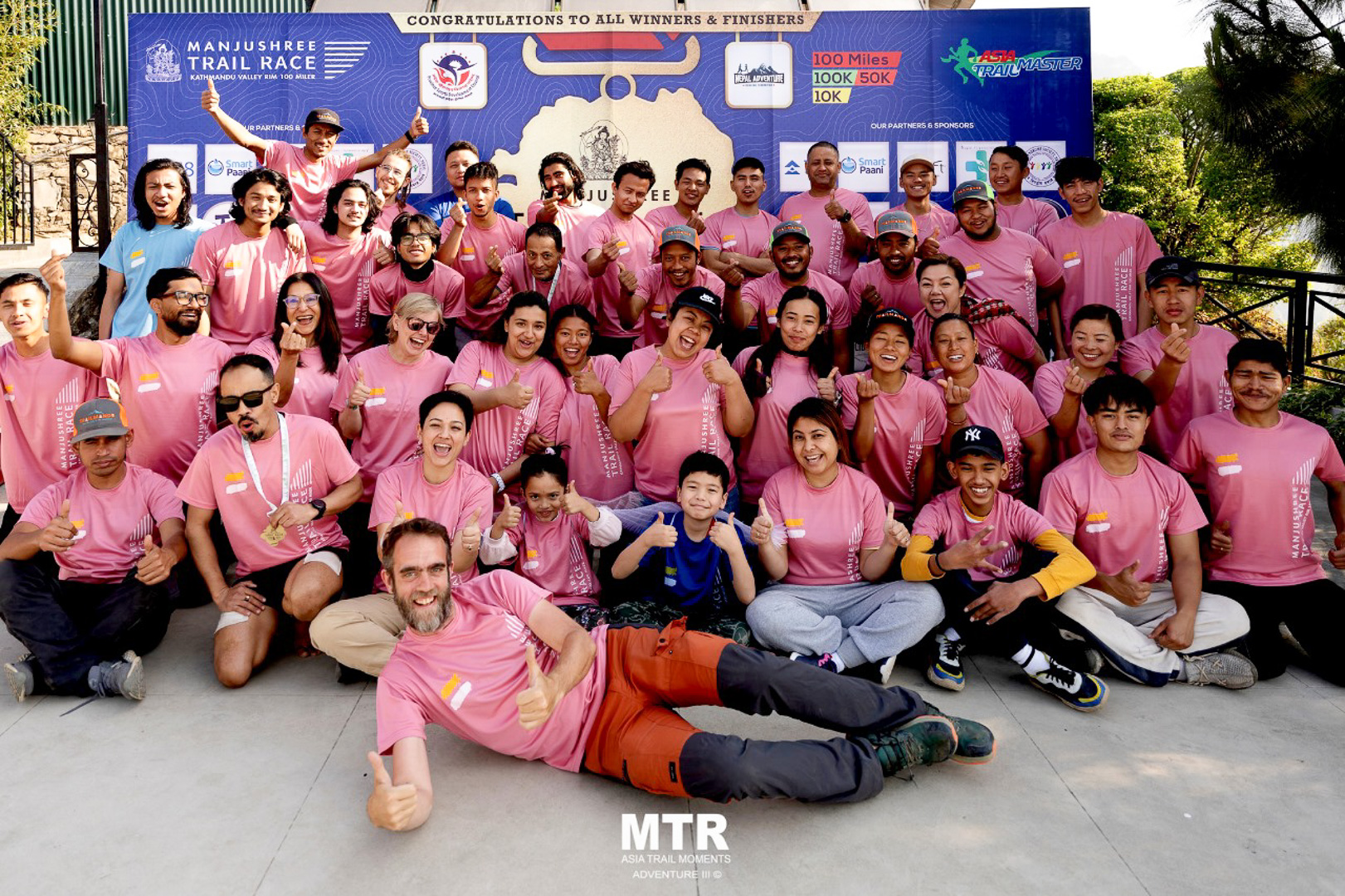 Trailmandu volunteers assisting runners at a high-altitude aid station